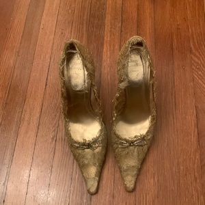 Rene Caovilla Gold lace pump. They are in good condition and they are size 37.